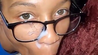 Ebony Woman Gets Her Face Covered With Cum